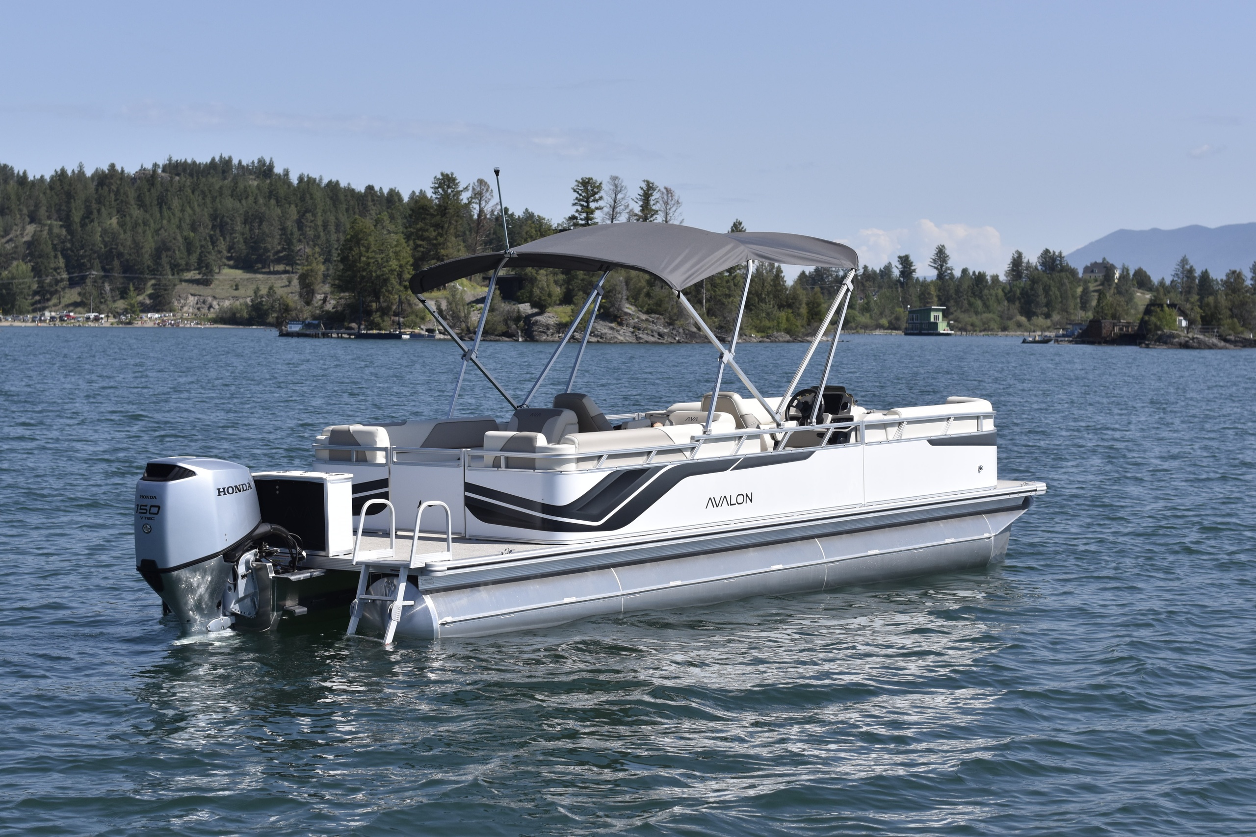 26′ Quad Lounger Pontoon Rental on Flathead Lake | Paddle Board