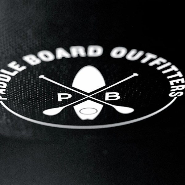 Close-up of Paddle Board Outfitters logo with crossed paddles.